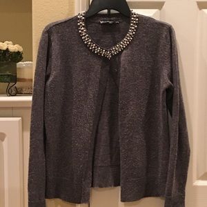 Grey cardigan with pearl crystal bib necklace